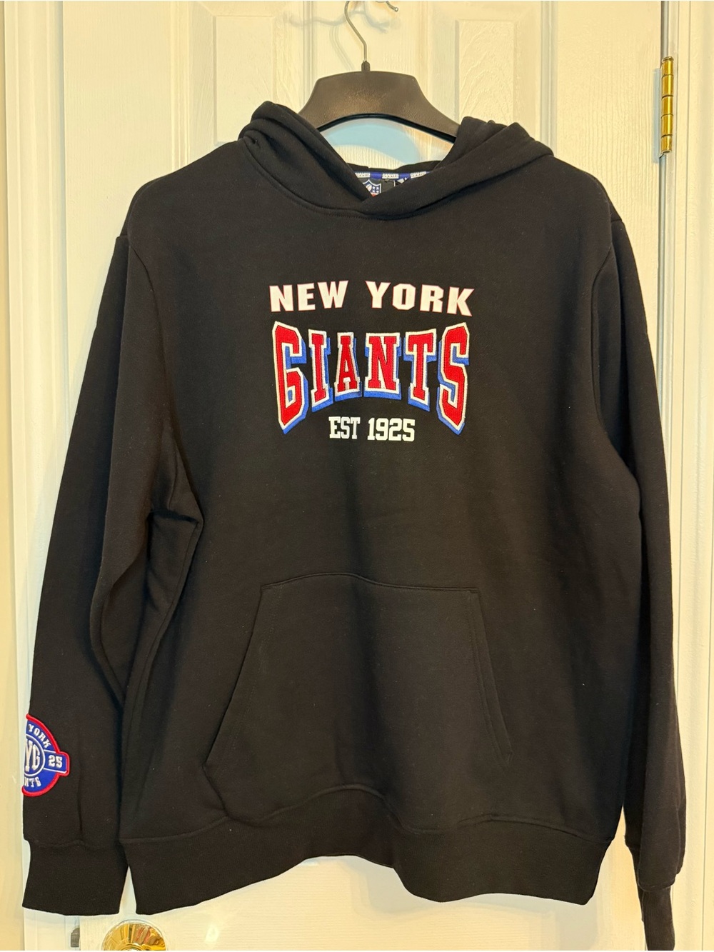 Official NFL New York Giants black hooded sweatshirt by Primark.